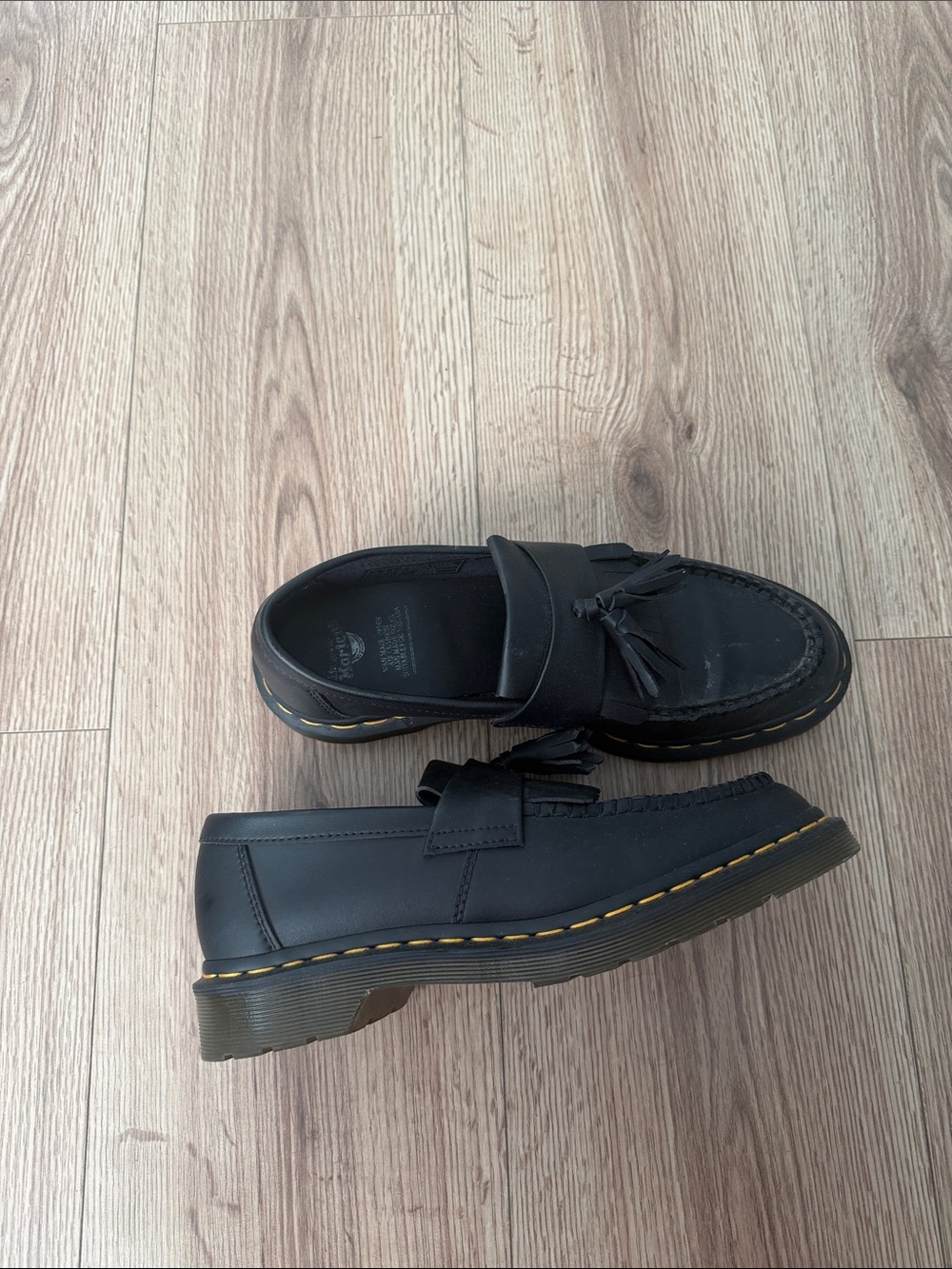 Dr. Martens Black Tassel Loafers with Yellow Stitching